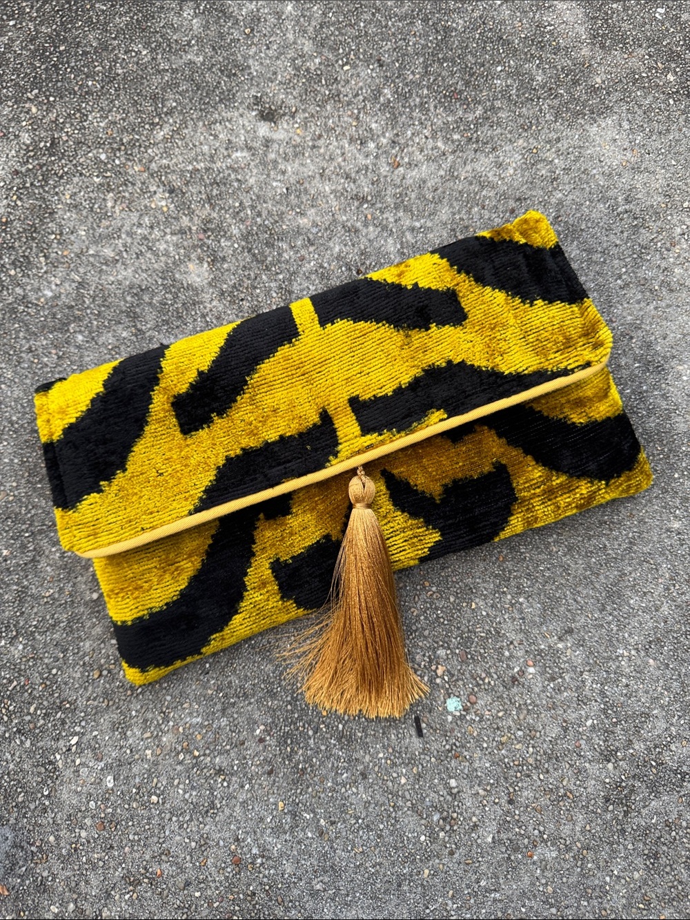 Mila x Miro Yellow and Black Tiger-Print Tassel Foldover Clutch